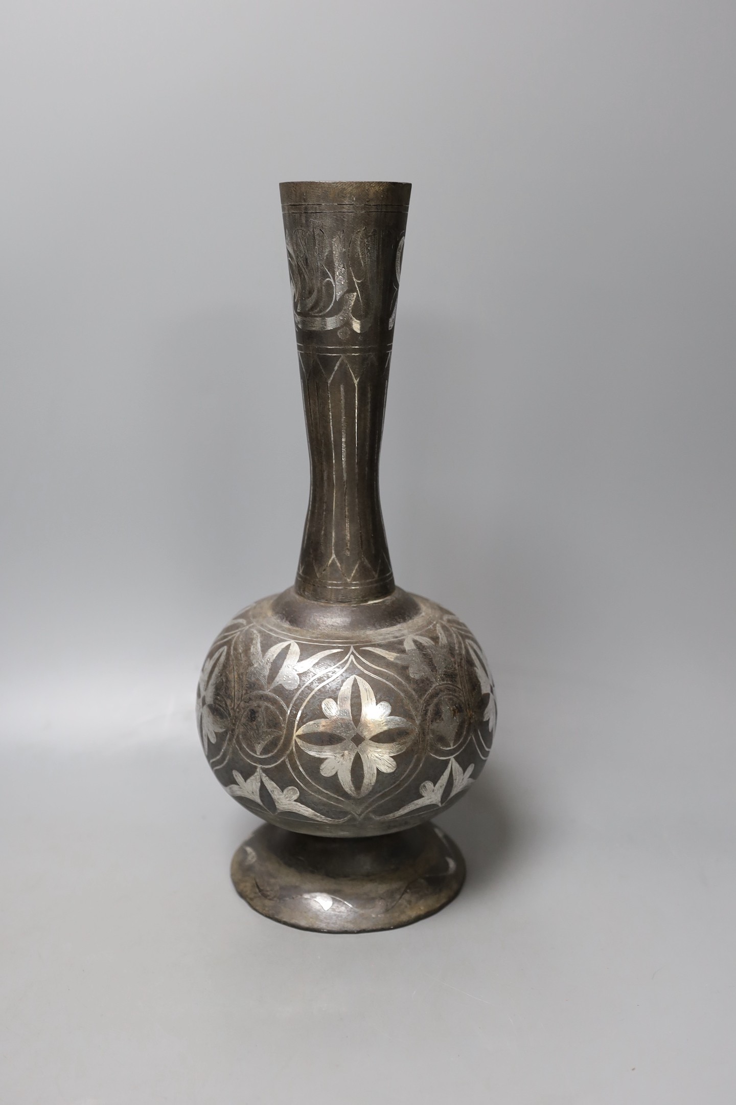 An Indian Bidriware vase, 34 cms high.